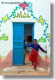africa, blues, boys, doors, egypt, nubian village, paintings, smiling, vertical, photograph