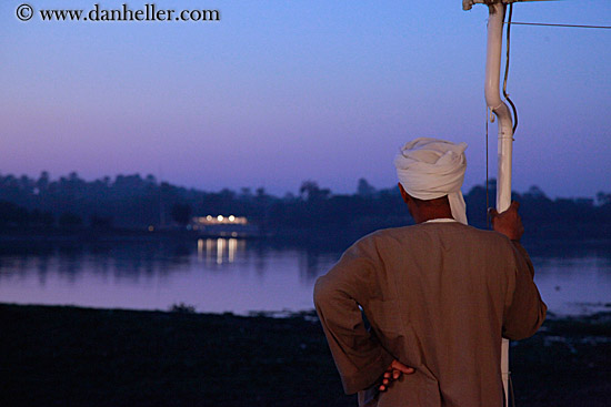 arab-looking-at-river-at-dusk.jpg