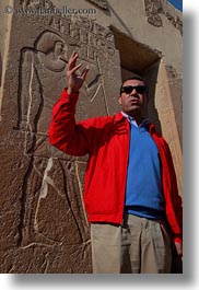 africa, ahmed, bas reliefs, clothes, egypt, gemni, people, sunglasses, talking, tombs, tour guides, vertical, wt people, photograph