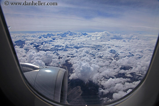 clouds-n-mtns-thru-airplane-window.jpg