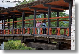 asia, asian, bhutan, bridge, buddhist, emotions, horizontal, laugh, religious, smiles, style, womens, photograph