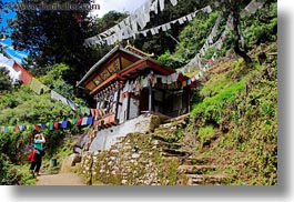 asia, bhutan, buddhist, buildings, flags, horizontal, houses, prayer flags, prayers, religious, photograph