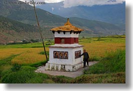 asia, bhutan, buddhist, horizontal, lobeysa village, men, prayers, religious, turning, wheels, photograph