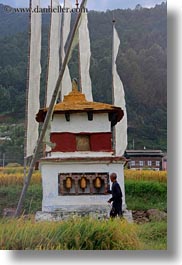 asia, bhutan, buddhist, lobeysa village, men, prayers, religious, turning, vertical, wheels, photograph