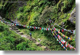 asia, bhutan, buddhist, flags, green, hikers, hiking, horizontal, lush, people, prayer flags, religious, photograph