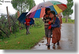 asia, asian, bhutan, childrens, clothes, colorful, colors, costumes, emotions, horizontal, people, smiles, style, umbrellas, photograph