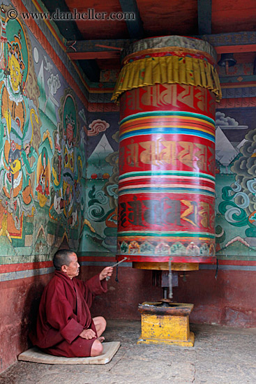 monk-turning-prayer-wheel-01.jpg