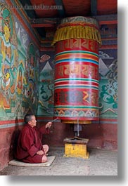 asia, asian, bhutan, buddhist, clothes, men, monks, people, prayers, religious, robes, style, turning, vertical, wheels, photograph