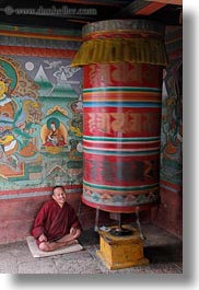 asia, asian, bhutan, buddhist, clothes, men, monks, people, prayers, religious, robes, style, turning, vertical, wheels, photograph