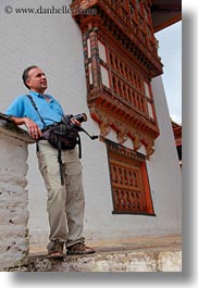 artists, asia, asian, bhutan, cameras, hashmat, people, photographers, punakha dzong, temples, vertical, photograph