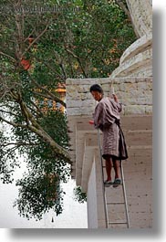 asia, asian, bhutan, buddhist, ladder, men, people, punakha dzong, religious, temples, vertical, photograph