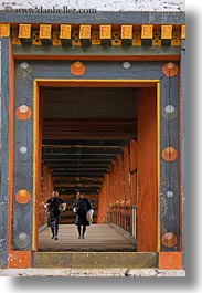 asia, asian, bhutan, bridge, buddhist, clothes, men, over, people, punakha dzong, religious, robes, temples, vertical, walking, photograph