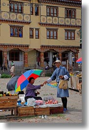 asia, asian, bhutan, farmers, foods, market, people, street market, umbrellas, vertical, photograph