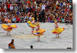 asia, asian, bhutan, buddhist, clothes, costumes, dancers, horizontal, people, religious, spinning, style, tashichho dzong, yellow, photograph