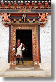 asia, asian, bhutan, buddhist, clothes, doors, guides, people, religious, robes, style, tashichho dzong, tours, vertical, photograph