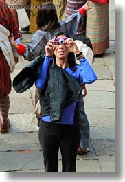 asia, bhutan, cameras, eyes, people, purple, vertical, wangduephodrang dzong, womens, photograph