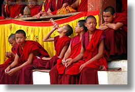asia, asian, bhutan, buddhist, clothes, coca cola, colors, horizontal, monks, people, red, religious, robes, style, wangduephodrang dzong, photograph