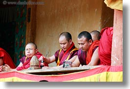 asia, asian, bhutan, buddhist, clothes, coca cola, colors, horizontal, monks, people, red, religious, robes, style, wangduephodrang dzong, photograph