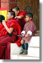 asia, asian, bhutan, boys, buddhist, clothes, colors, monks, people, red, religious, robes, style, vertical, wangduephodrang dzong, photograph