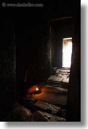 images/Asia/Cambodia/AngkorThom/Bayon/candles-w-stone-walls-3.jpg