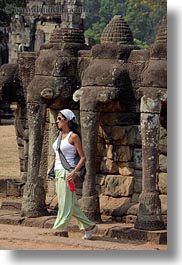 angkor thom, asia, cambodia, elephant terrace, elephants, stones, tourists, vertical, walls, womens, photograph