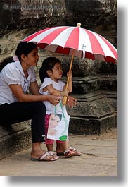 images/Asia/Cambodia/AngkorWat/People/Kids/girl-w-red-white-striped-umbrella-1.jpg
