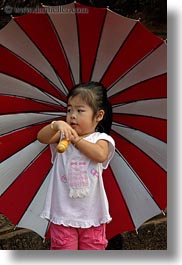 images/Asia/Cambodia/AngkorWat/People/Kids/girl-w-red-white-striped-umbrella-3.jpg