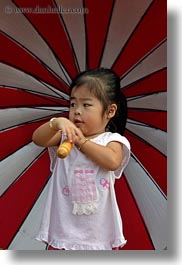 images/Asia/Cambodia/AngkorWat/People/Kids/girl-w-red-white-striped-umbrella-4.jpg