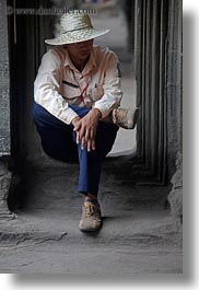 angkor wat, asia, cambodia, hats, men, people, sitting, vertical, photograph