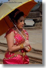 angkor wat, asia, cambodia, dresses, people, traditional, umbrellas, vertical, womens, photograph