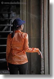 angkor wat, asia, baseball, blues, cambodia, cap, oranges, people, vertical, womens, photograph