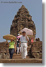 images/Asia/Cambodia/Bakong/japanese-tourists-w-umbrellas-3.jpg