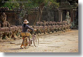 asia, bicycles, cambodia, gates, horizontal, pushing, victory gate, womens, photograph