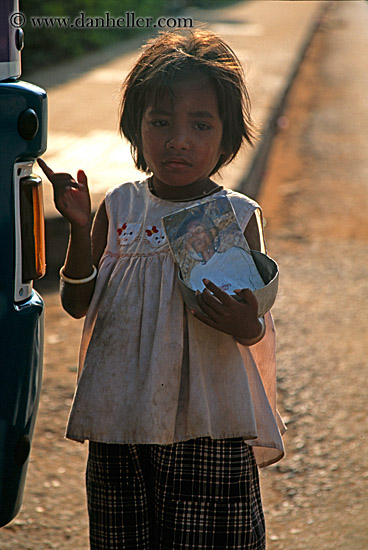 cambodian-girl-holding-photo-of-man.jpg