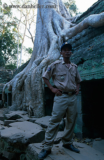 cambodian-guard-n-tree-roots.jpg