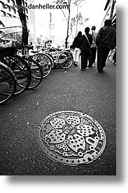 asia, japan, japanese, manhole covers, manholes, vertical, photograph