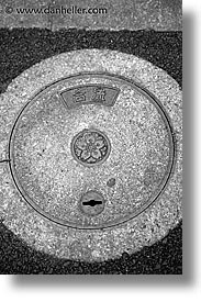 asia, black and white, japan, manhole covers, manholes, small, vertical, photograph