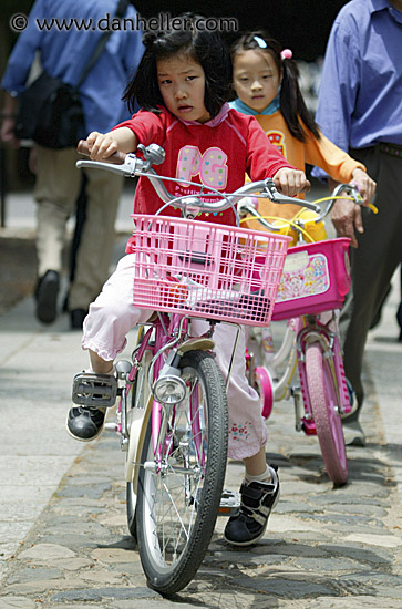 girl-in-red-on-bike-1.jpg