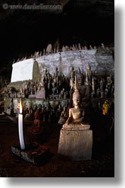 asia, buildings, candles, cave temple, laos, luang prabang, statues, temples, vertical, photograph