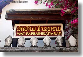 asia, bougainvilleas, buddhist, buildings, flowers, horizontal, laos, luang prabang, nature, paphaimisaiyaram, religious, signs, temples, wat, photograph