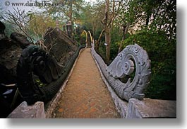 asia, bricks, buildings, hands, horizontal, laos, long exposure, luang prabang, paths, phou si mountain, rails, snakes, temples, photograph