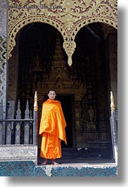 images/Asia/Laos/LuangPrabang/Buildings/Temples/Xiethong/Monk/monk-at-temple-gate-1.jpg
