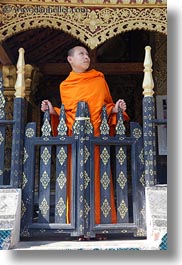 asia, buddhist, buildings, gates, laos, luang prabang, monks, religious, temples, vertical, xiethong, photograph