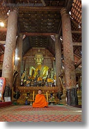 asia, buddhas, buddhist, buildings, golden, laos, luang prabang, monks, religious, sitting, slow exposure, temples, vertical, xiethong, photograph