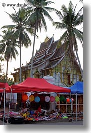 asia, bazaar, laos, luang prabang, market, nature, palm trees, plants, structures, temples, tents, trees, vertical, photograph
