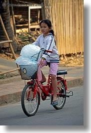 asia, bicycles, childrens, girls, ice, laos, luang prabang, people, vertical, photograph