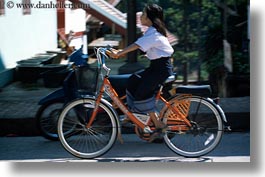 asia, asian, bicycles, childrens, colors, girls, horizontal, laos, luang prabang, motion blur, oranges, people, photograph