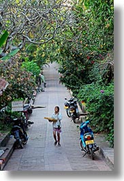 asia, childrens, girls, laos, luang prabang, people, streets, vertical, walking, photograph