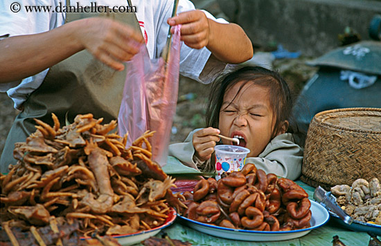 girl-wincing-at-eating-yogurt.jpg