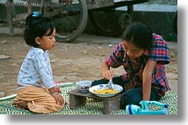 asia, childrens, eating, girls, horizontal, laos, luang prabang, people, photograph